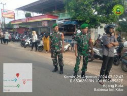 Empat Orang Personil Koramil 02 Bintim Lakukan Pengamanan Gerak Jalan